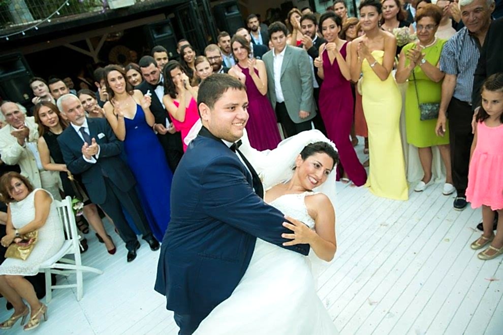 A pose from the dance of a bride and groom at their wedding reception.